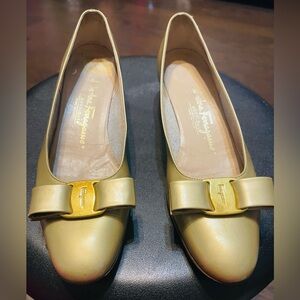Salvatore Ferragamo Gold Flats with Signature Vara Bow